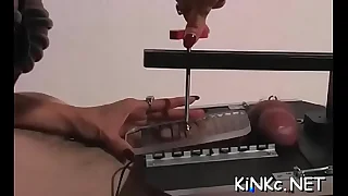 Hard footjob together with ball crushing